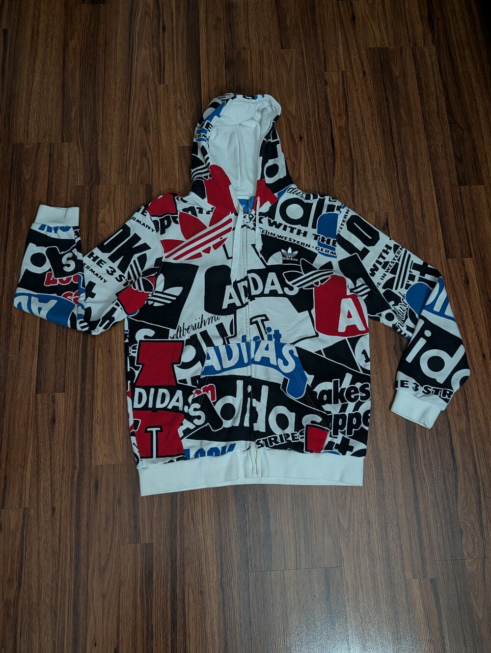 Adidas Graphic Logo Zip-Up Hoodie in White, Black, Red & Blue